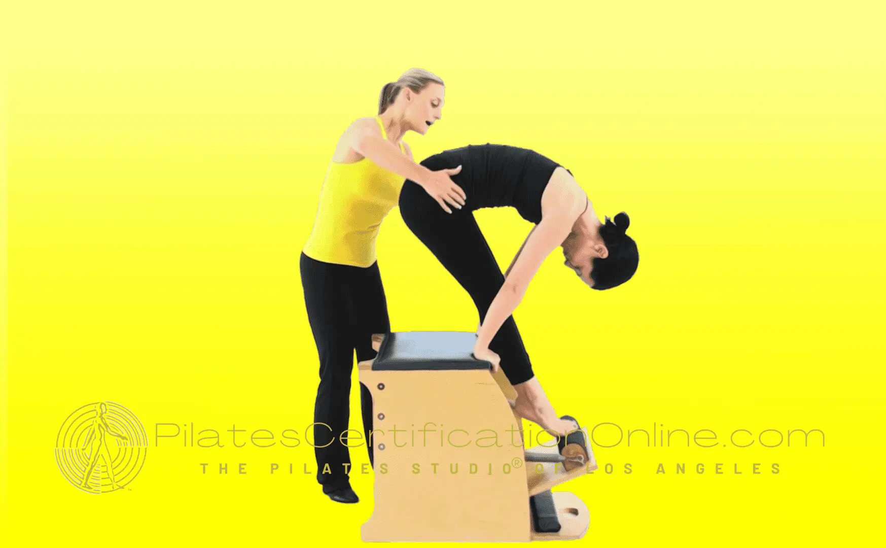 A woman is doing pilates on the box