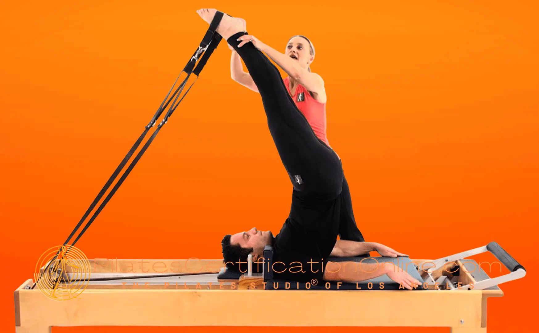 A man and woman doing yoga on the floor.