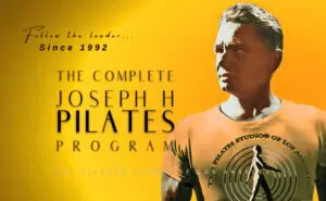 A man is standing in front of the words " joseph h pilates program ".