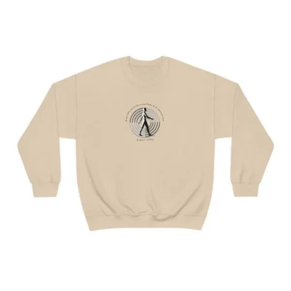 A beige sweatshirt with an image of a person walking.