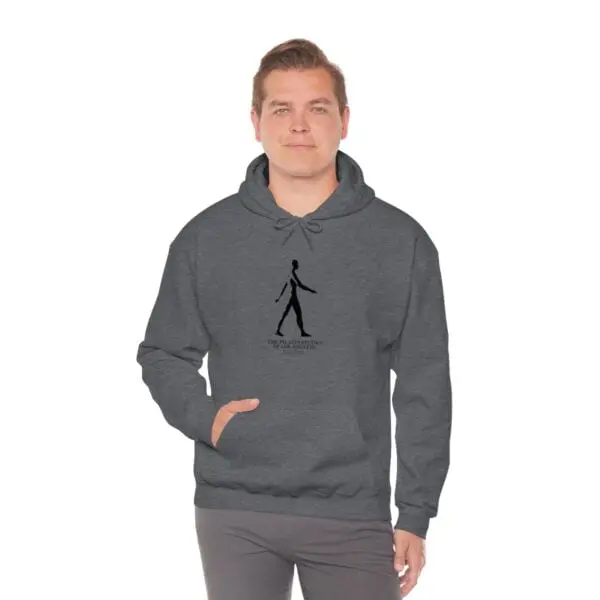 A man in grey hoodie with black logo.