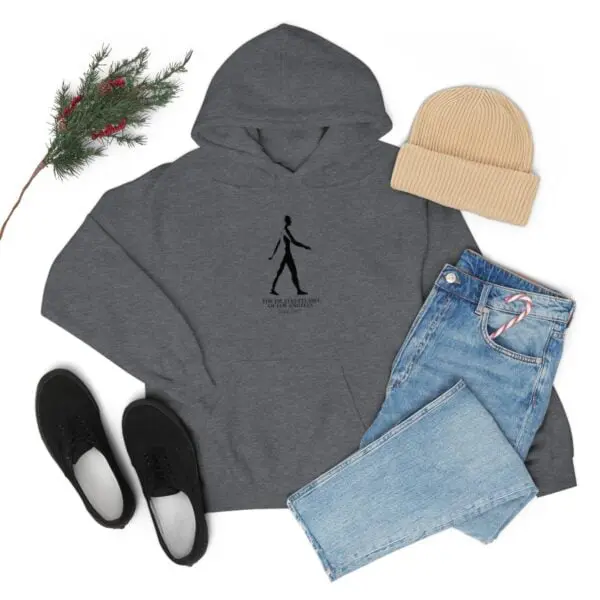 A gray hoodie with a person walking on it.