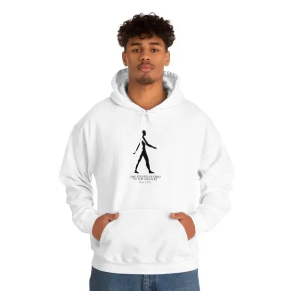 A man in white hoodie with a drawing of a person walking.