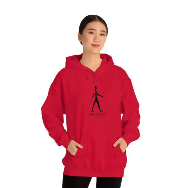 A woman in red hoodie with black stick figure on it.