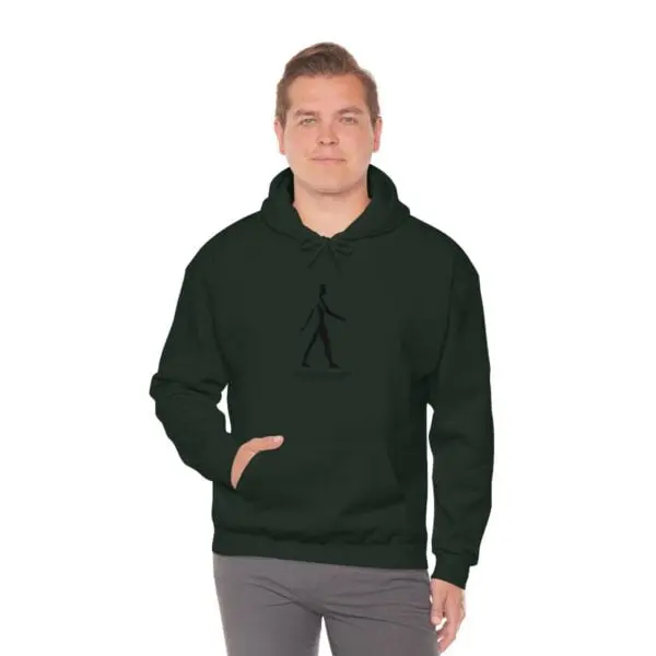 A man in black hoodie with an image of a person walking.