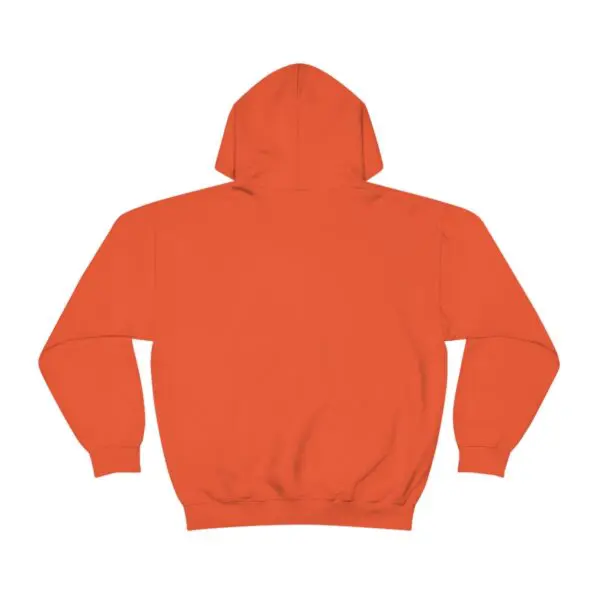 A person wearing an orange hoodie with a logo on it.