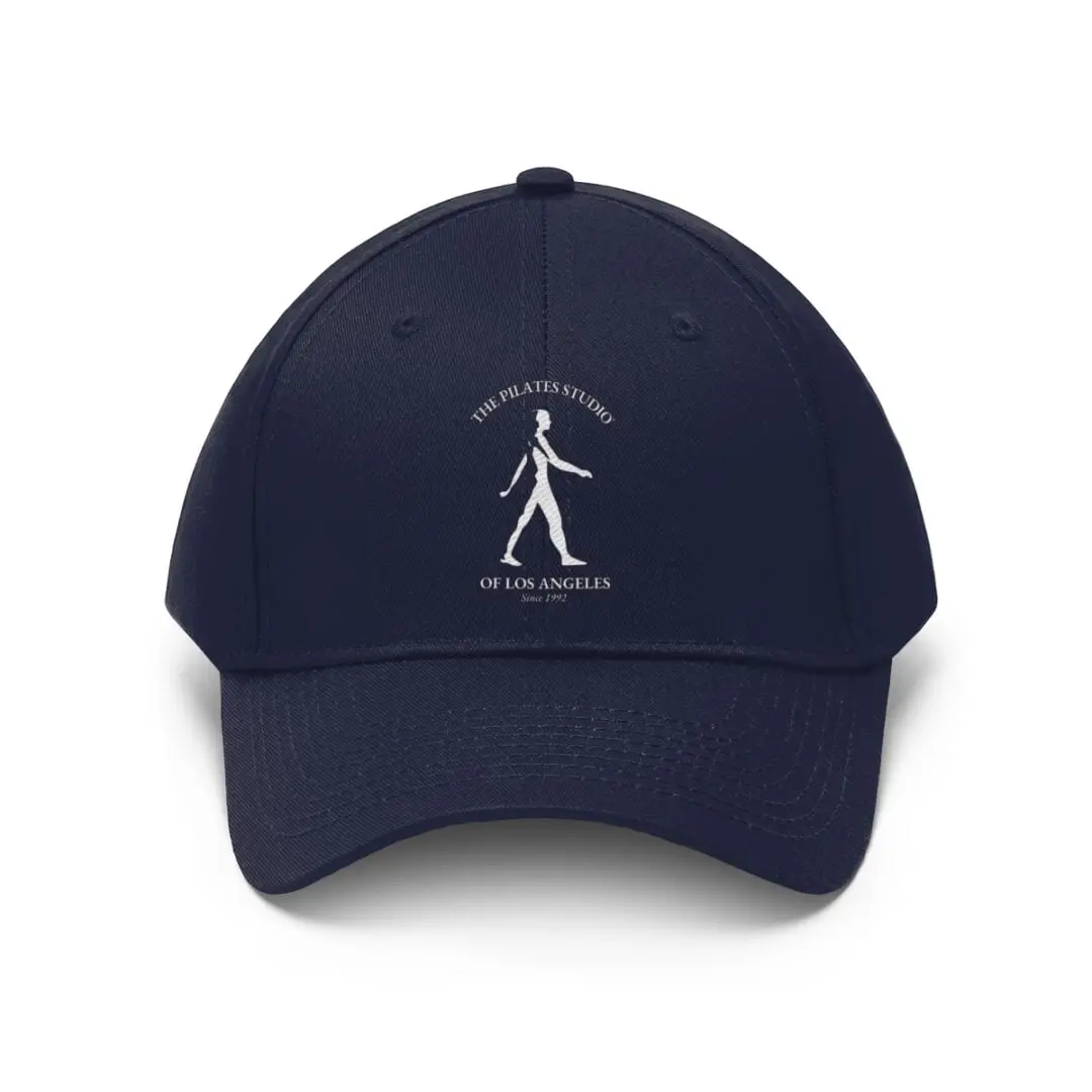 A navy blue hat with an image of a person walking.